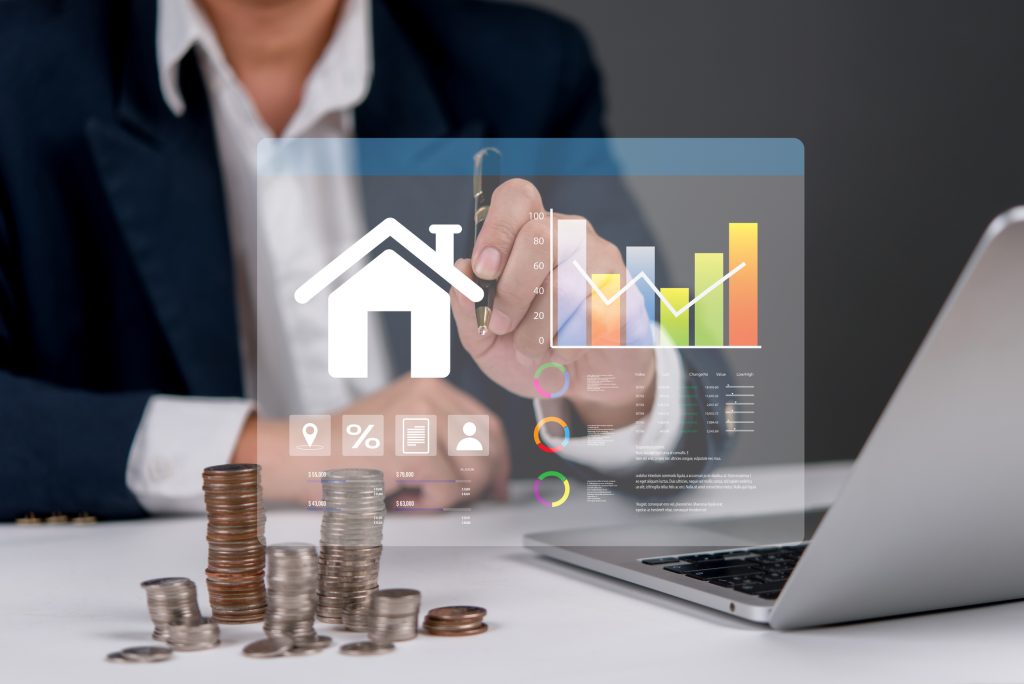 Real estate investment analysis with smart data dashboard, financial chart, and stacked coins, representing housing market, property finance and ROI strategy.